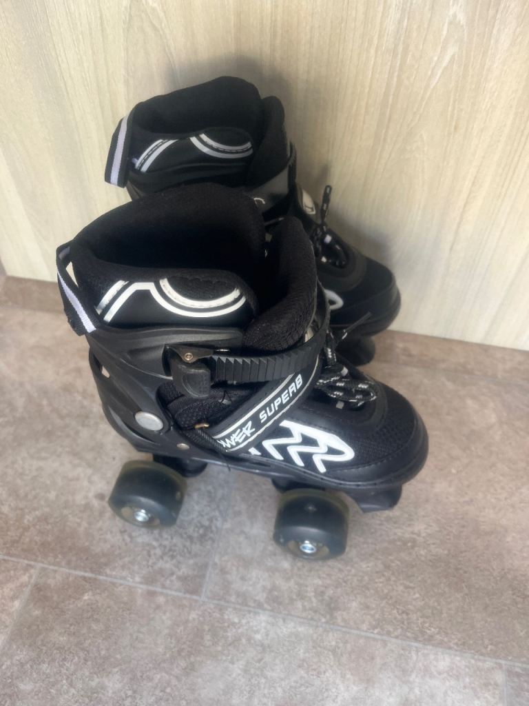 Black Roller Skates - As Good As New