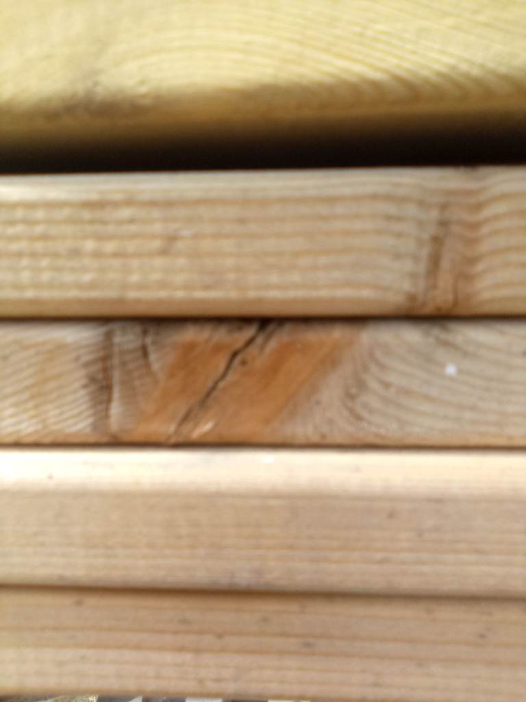 Venetian timber fence slats treated 