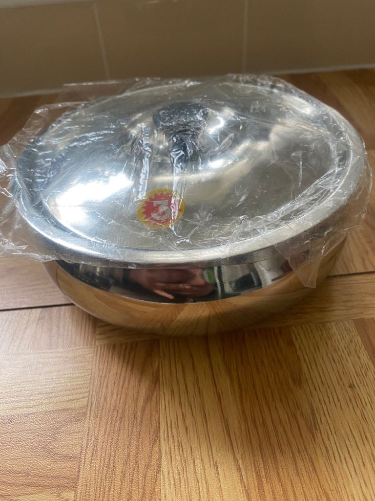 Stainless steel pot . 