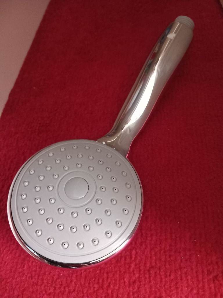 New shower head.  Buyer to collect.
