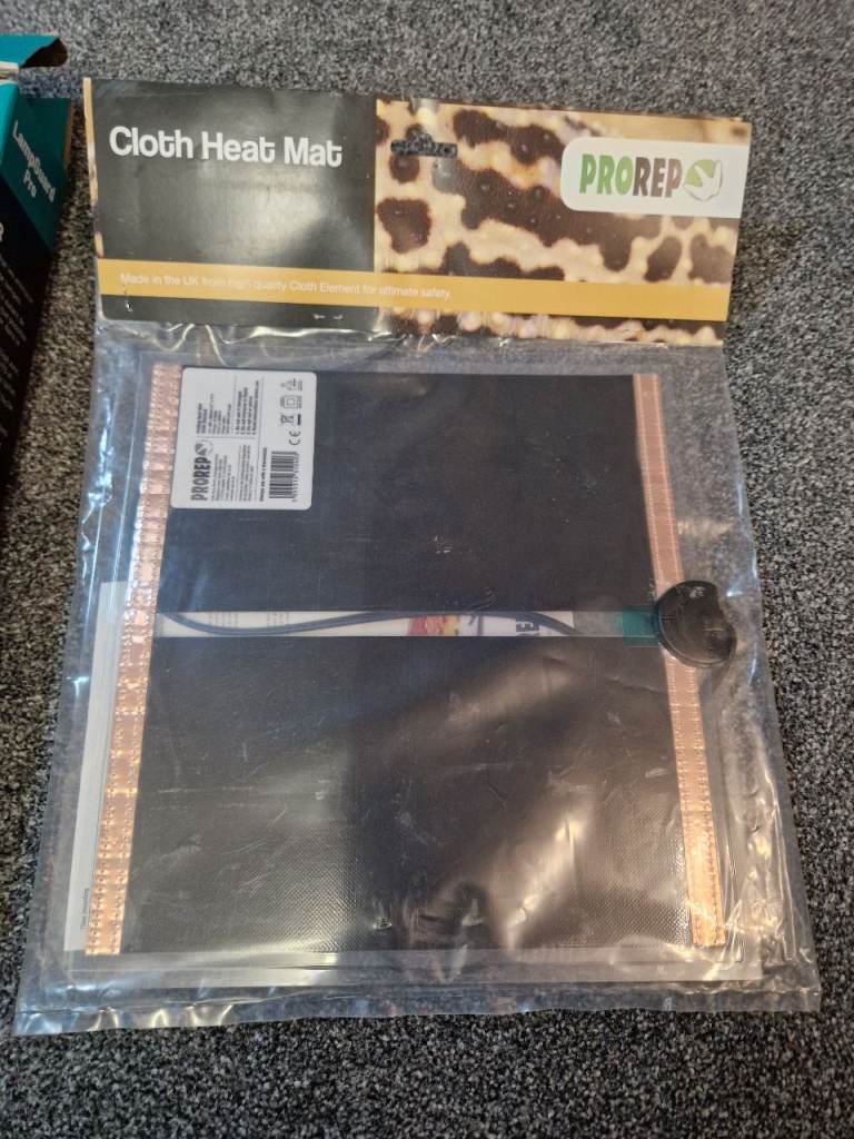 11" x 11" brand new heat mat