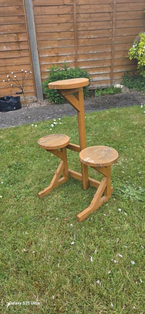 Wooden plant pot stand. 
