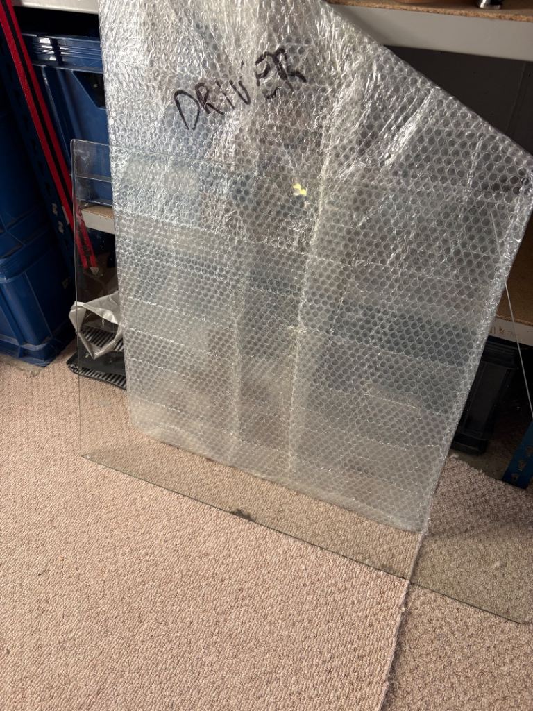 Defender passenger door glass .Christchurch 