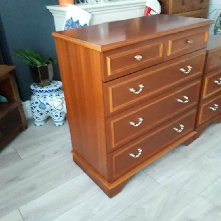 BEAUTIFUL STAG CHEST OF DRAWERS TOGETHER WITH A MATCHING BEDSIDE CHEST FOR SALE . COULD DELIVER .
