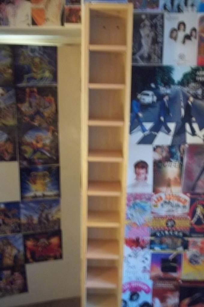 CD STORAGE TOWER       STANDS UPRIGHT AGAINST WALL  8" X 7" X 78"