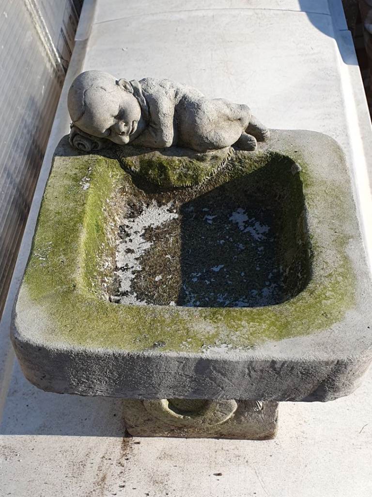 Sleeping baby budha stone bird bath