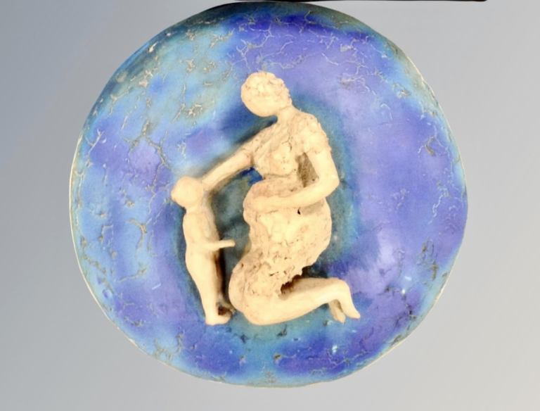 20th C pottery relief plaque (54cm) of Mother Earth & child £99ono