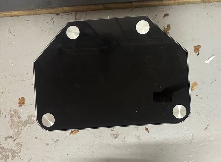 Sparingly used tempered glass tv stand 