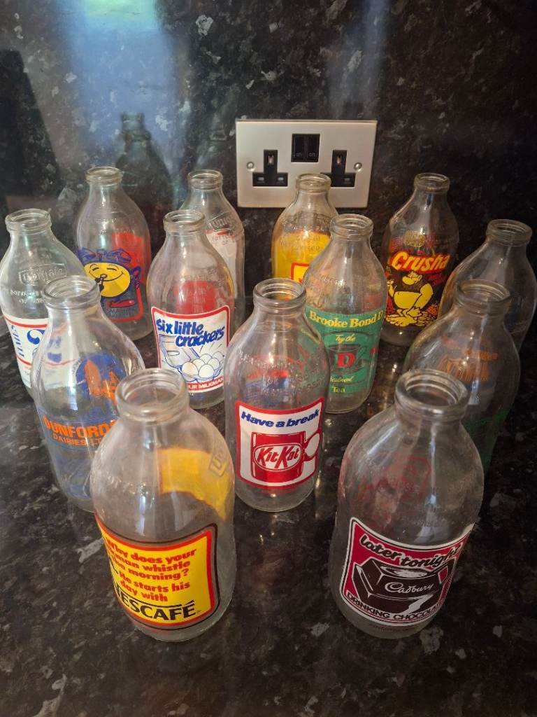 Collection of Vintage Advertisement Milk Bottles - 13 in total