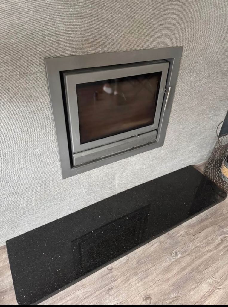 Inset stove and marble hearth