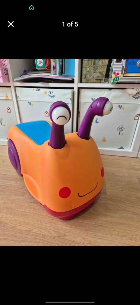B Toys Buggly Wuggly ride on with lights and sound slug 
