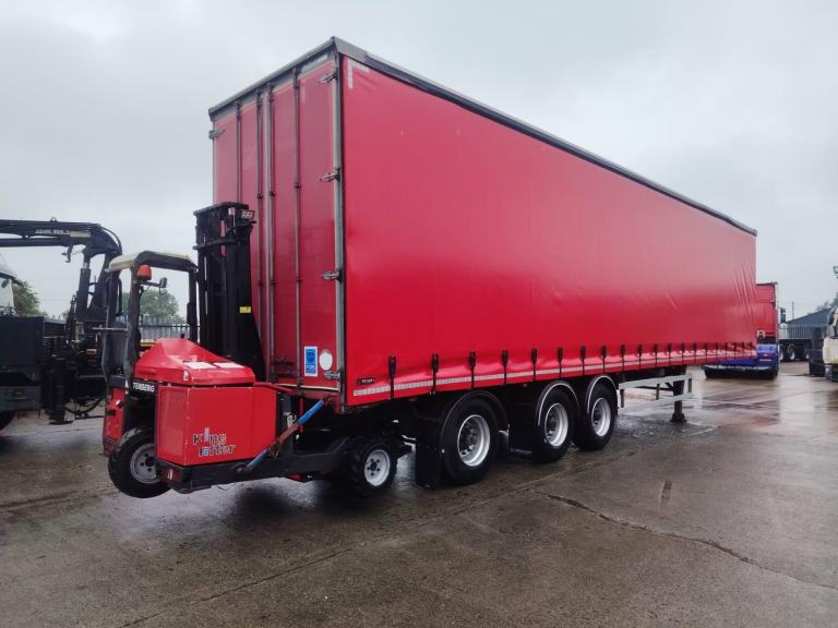 2017 Curtainside trailer Moffet brackets 4.56 high Rear steering axle drum