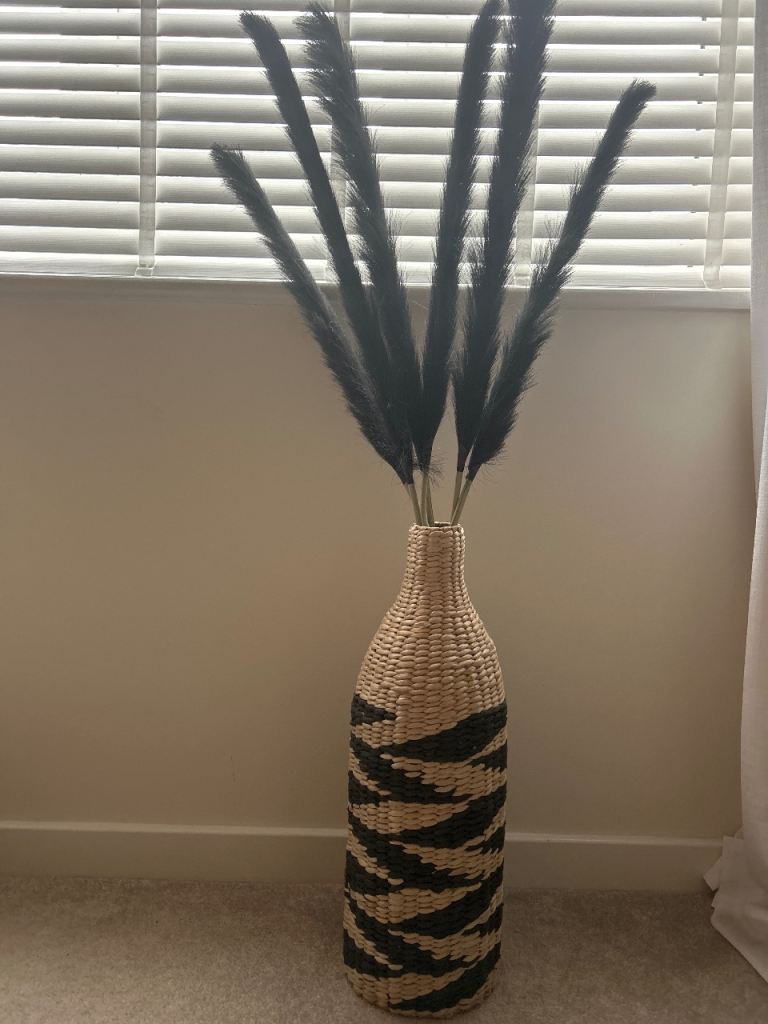 Woven vase with pampas grass