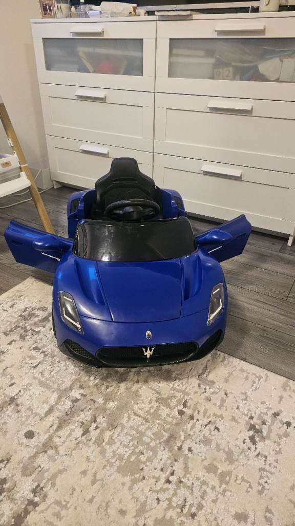 Blue Maserati Style Ride-On Car – Good Condition