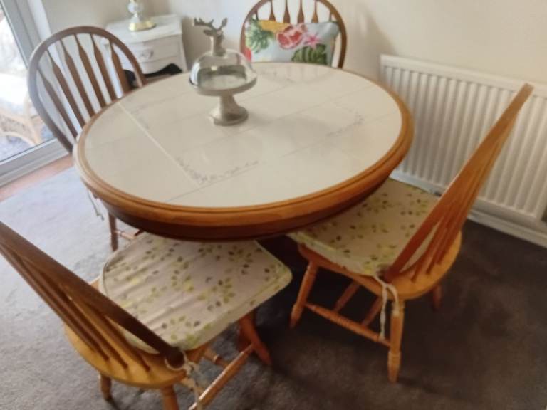 Small round wooden table and 4 chairs