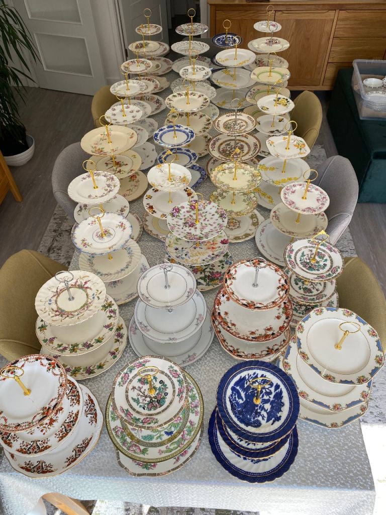 Cake stands , cups saucers , plates , tea pots 