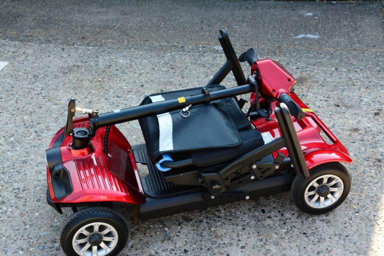 Red Mobility Scooter – Foldable, as new condition.