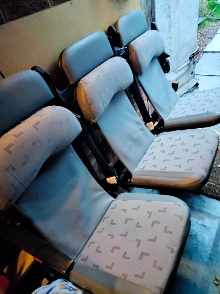 Flip down rearward facing seats