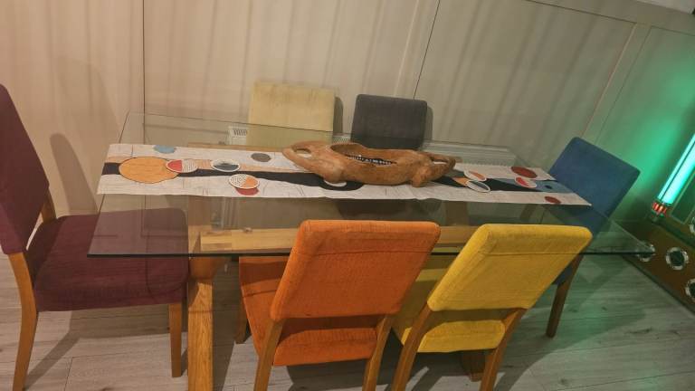 Free table and 6 mixed chairs.