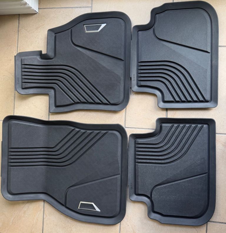Genuine BMW 1 Series all weather rubber floor mats.