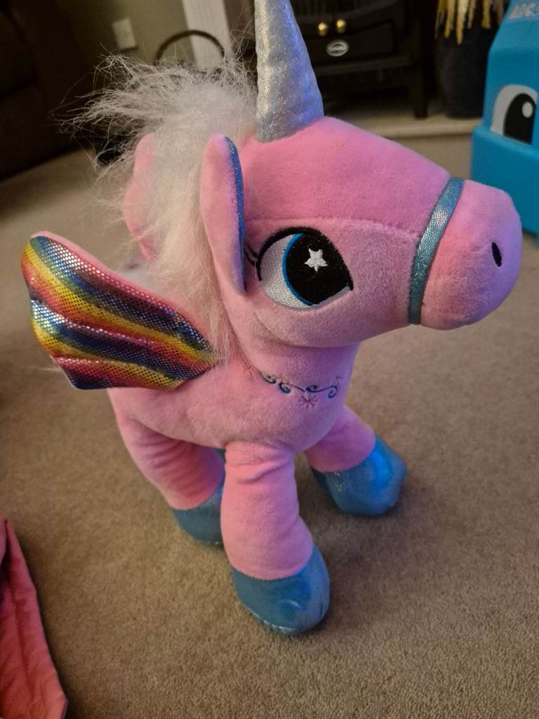 Bundle of toys and dressing gown.