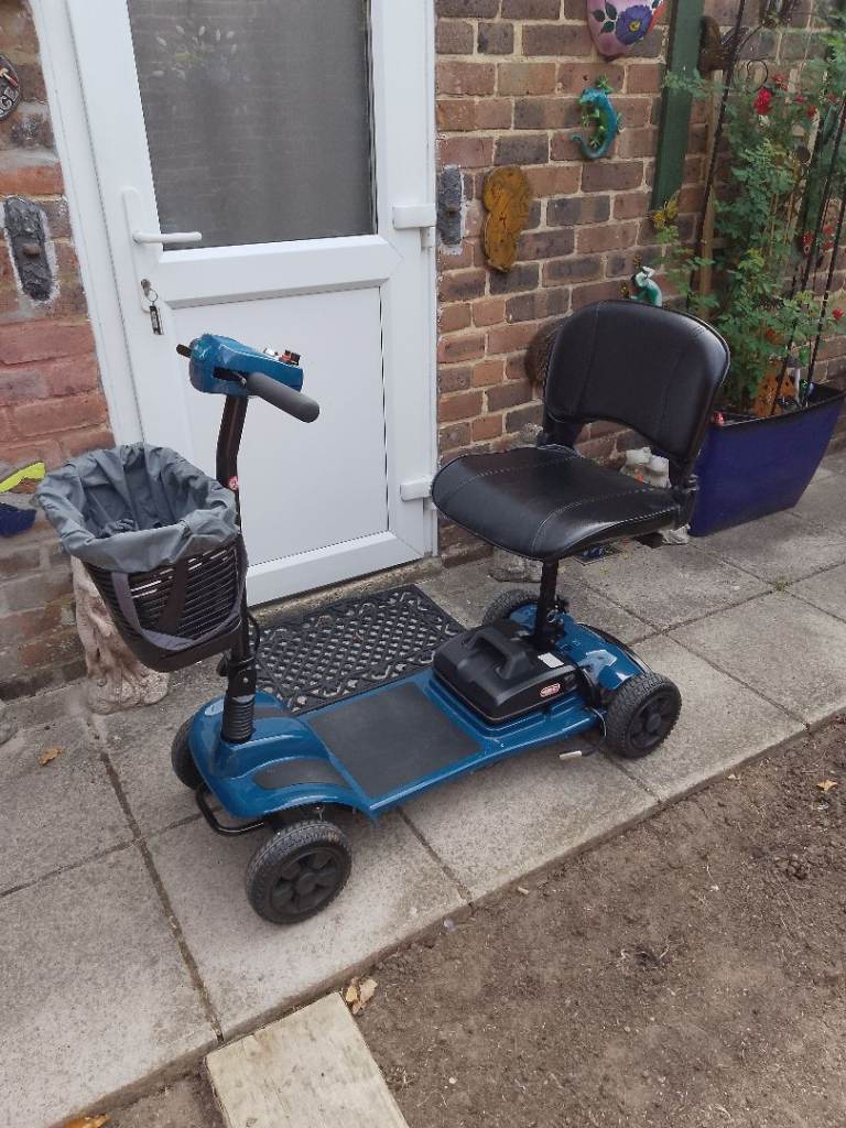 Blue Mobility Scooter with Basket – Good Condition