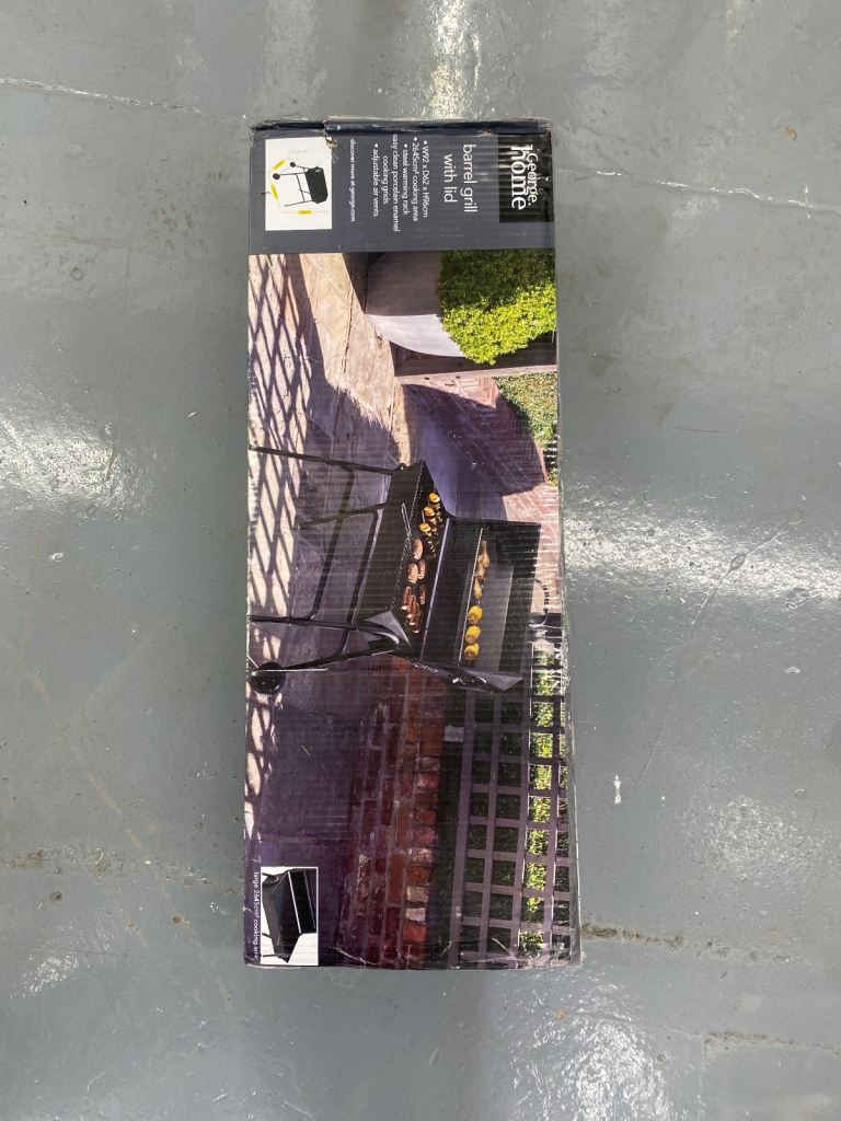 Brand new barrel Grill with Lid 