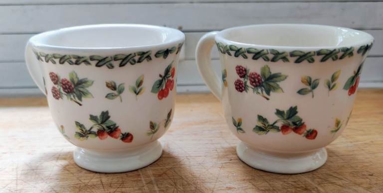 Two decorative Italian cups - white with fruits design