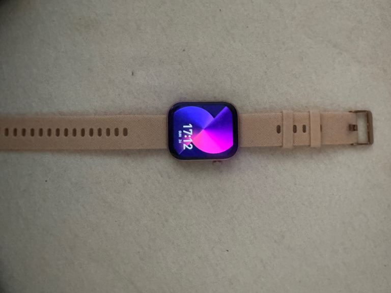 Smart Watch with Pink Strap – Good Condition