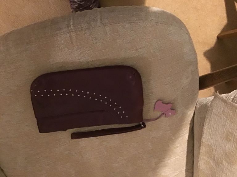 RADLEY CLUTCH BAG. MAROON COLOUR. USED A LITTLE. SELL FOR 40