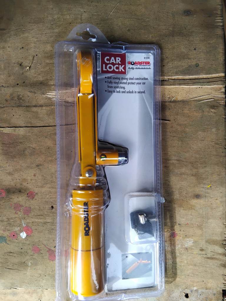 Roadster car lock, gearstick to handbrake.