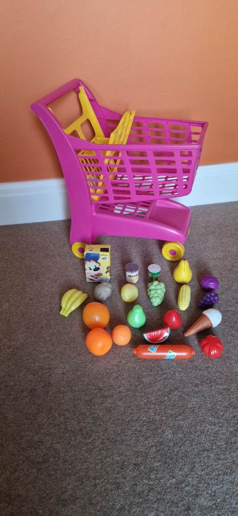 TOY SHOPPING TROLLEY WITH GROCERIES. IN EXCELLENT CONDITION.