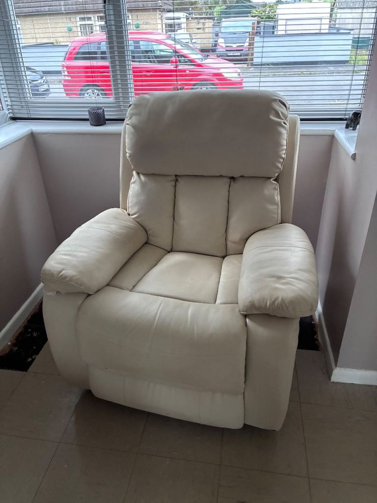 Cream coloured recliner chair 