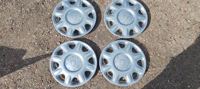 4 x original Rover 14" wheel trims 