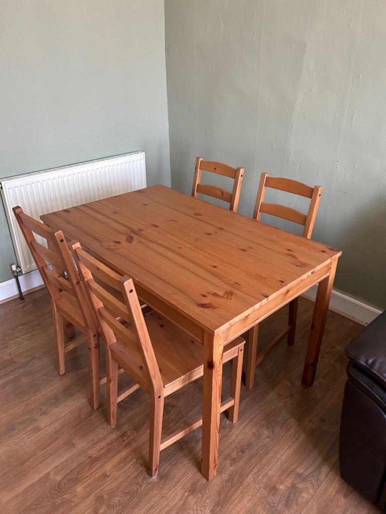 Dining table with four matching chairs 