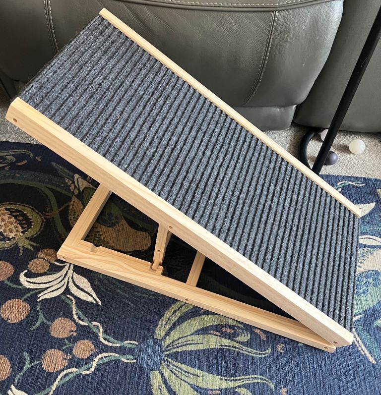 Brand-new pet ramp folds flat when not in use adjustable height