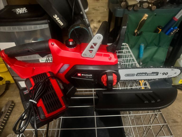 Einhell 30CM cordless chainsaw with charger and power pack unused