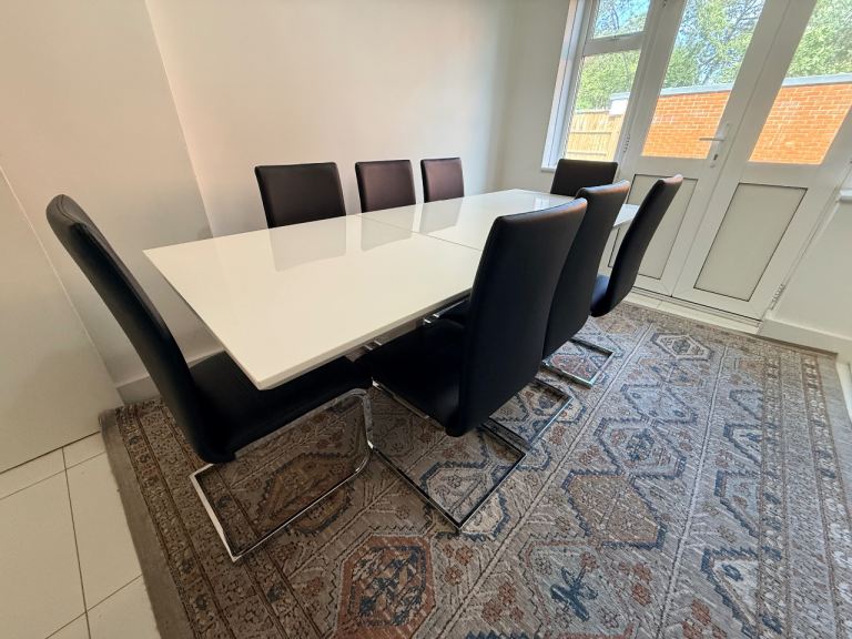 Large White Gloss Extendable Dining Table with 8 Black Chairs