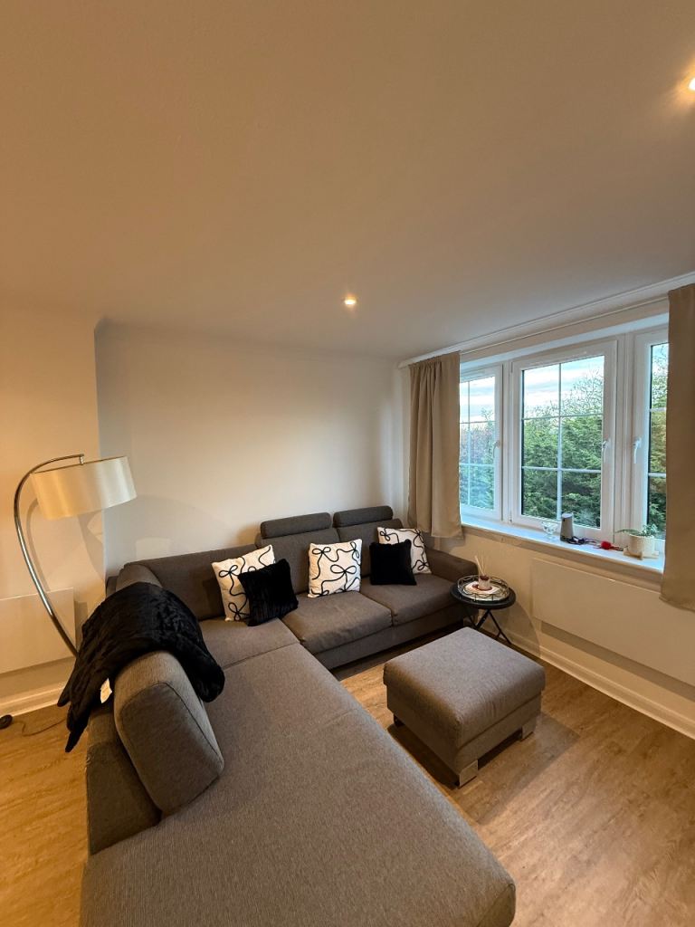 L shape sofa and foot rest as well 