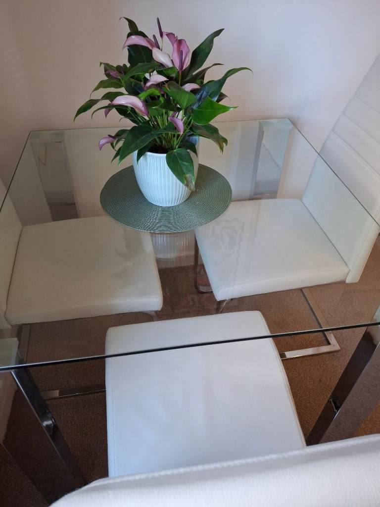 Glass dining table and 4 chairs