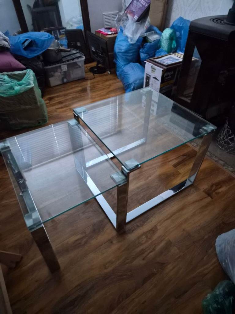 Two glass tables