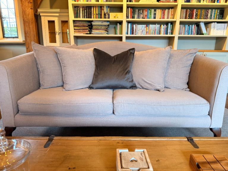 Two beautiful, high-quality sofas in a timeless neutral beige/stone fabric