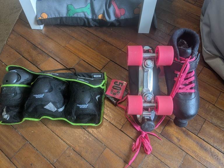 Black 'No Fear' Roller Skates with Pink Wheels, Protective Gear Set