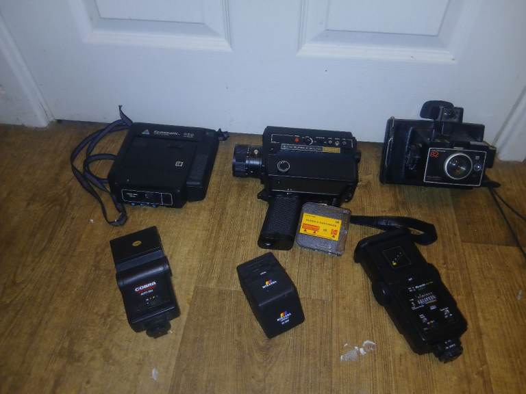 collection of vintage film and instant photography equipment