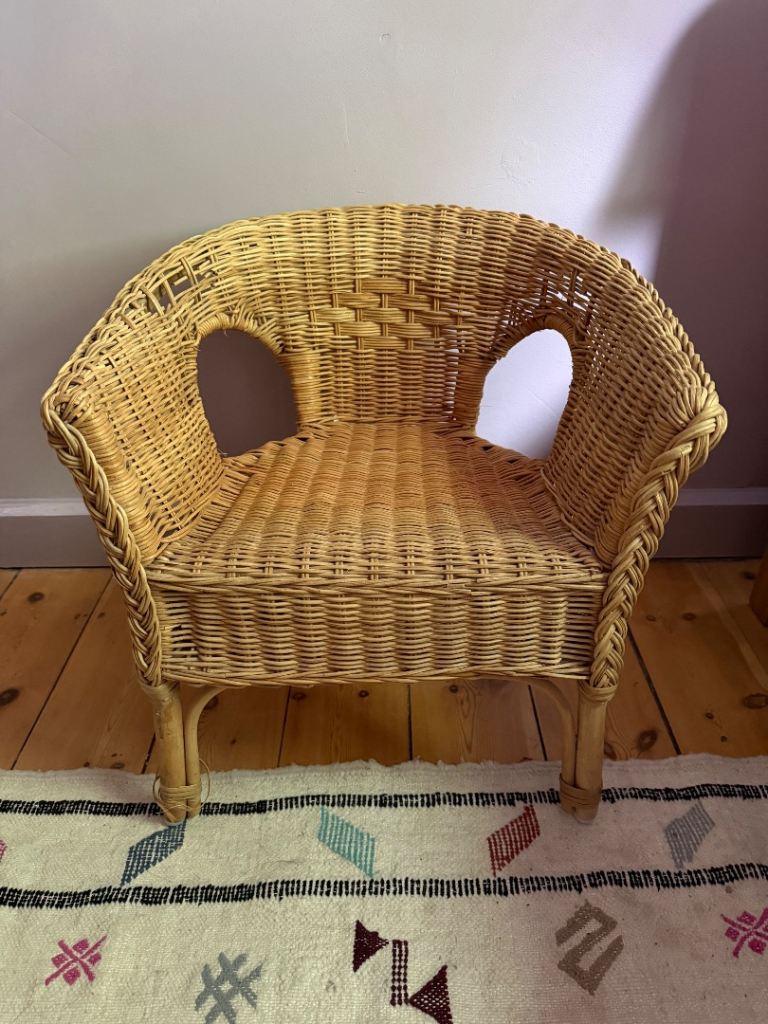 Vintage children’s wicker basket chair