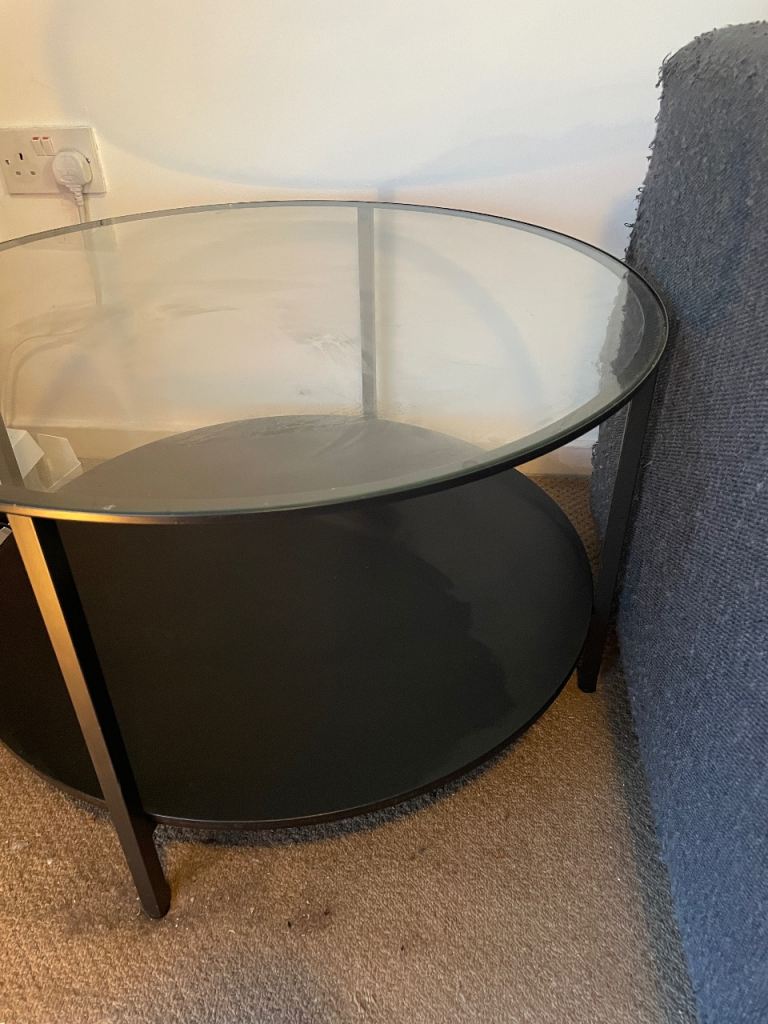 Simple two tier glass topped coffee table