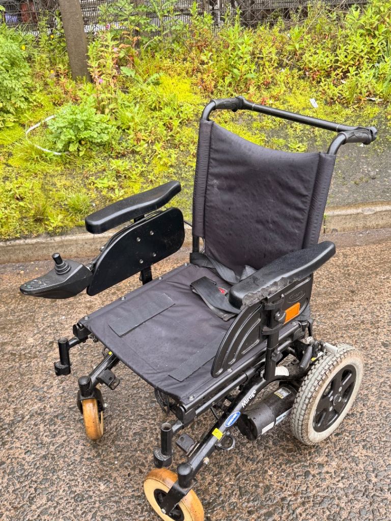 Invacare black rechargeable electric wheelchair with joystick (200 if gone this week). 