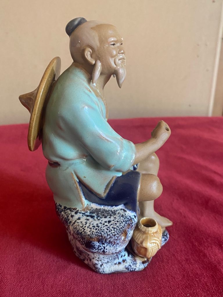 Chinese mudman  glaze fisherman.