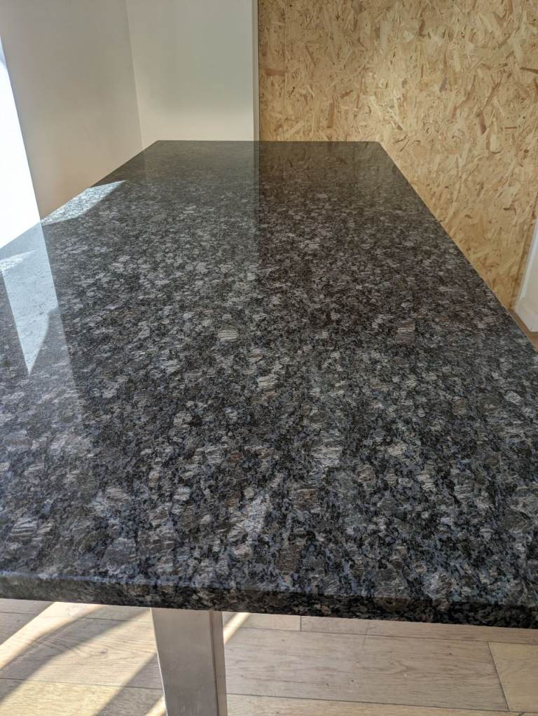 Solid granite dining table 90cm high x 210cm long