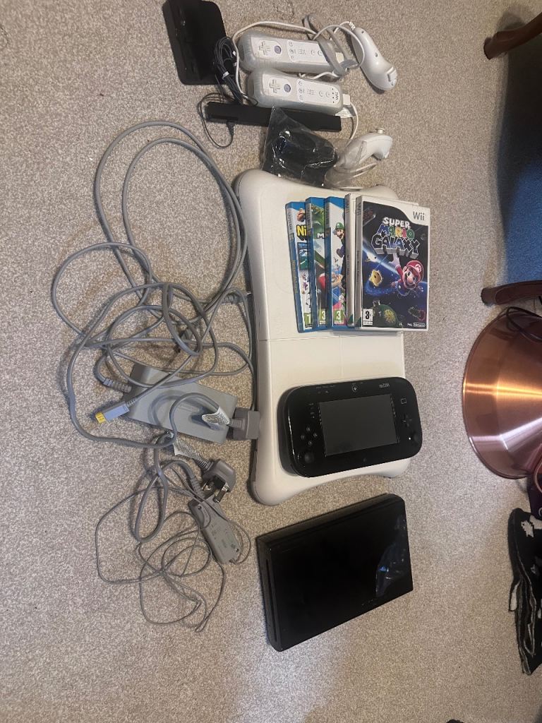 Wii U with various accessories and games